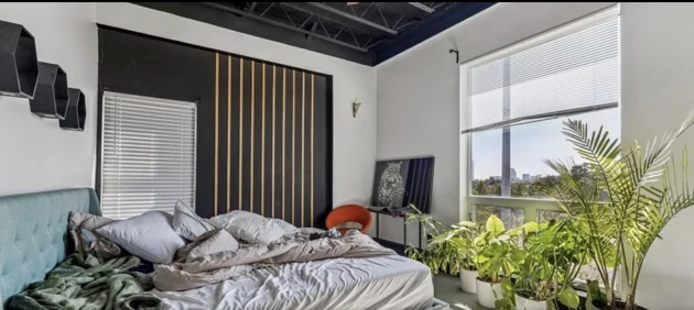 Bright bedroom with large windows