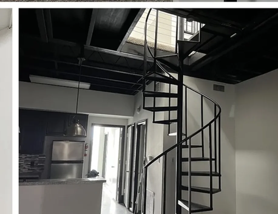 Loft residence with spiral staircase